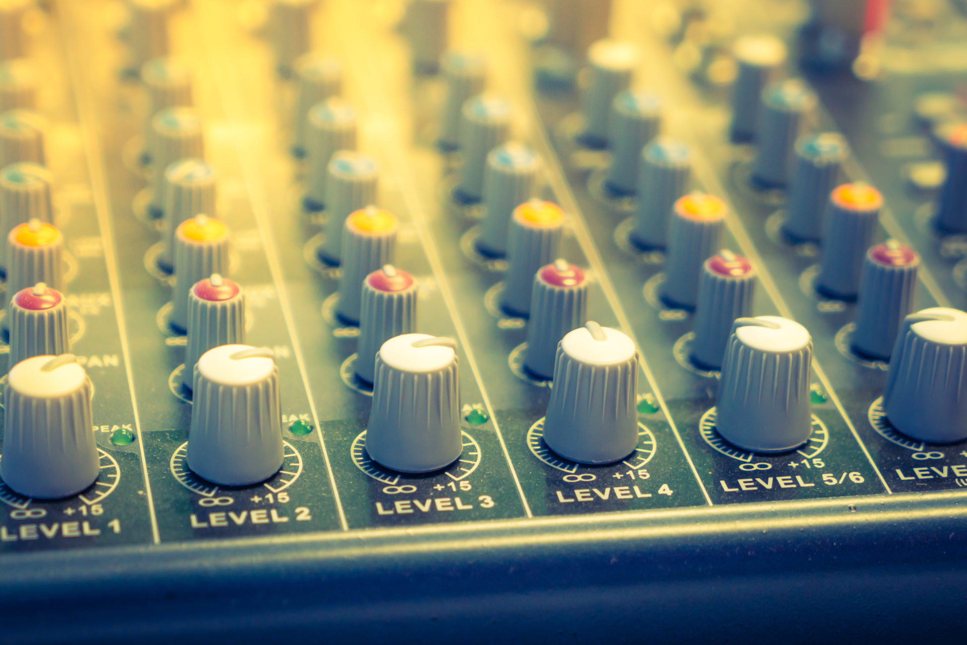 Music mixer desk with various knobs ( Filtered image processed v